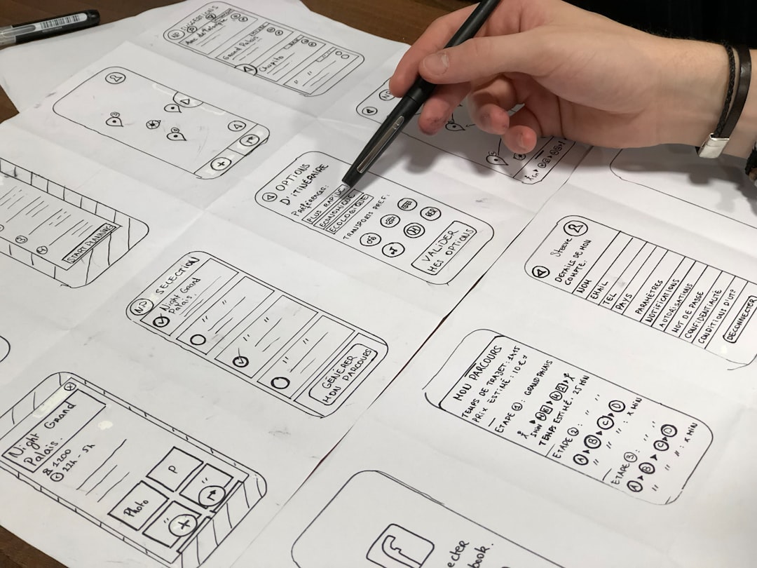 services-02 person-holding-pen-near-paper-sv8ooqaub-o